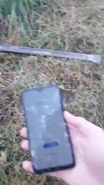 An iPhone being smashed